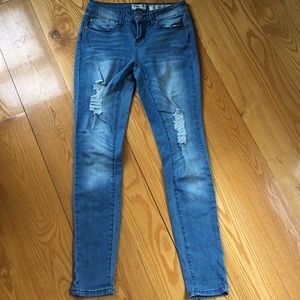 Stretchy skinny jeans w rips